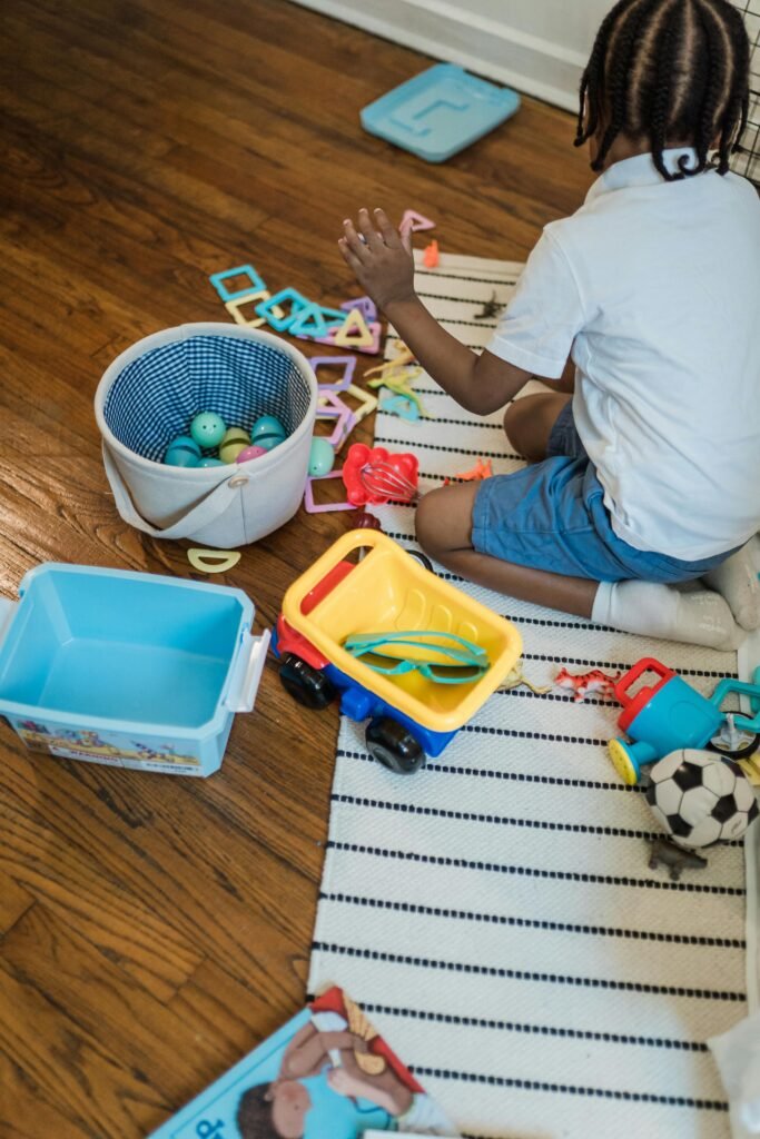 Toys spread across a small family living space